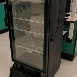 True GDM-10 glass door merchandiser refrigerator. Features self-contained refrigeration, a single hinged glass door, black exterior finish, and three 