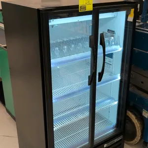 True TVM-30-HC~VM03 self-contained beverage cooler. Features (2) glass display doors, adjustable wire shelving with top shelf bottle organizers, and i