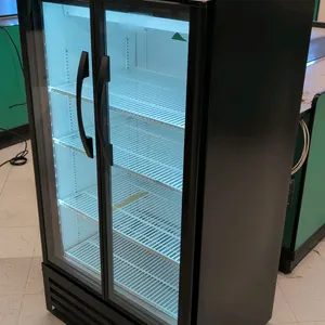 True TVM-30-HC~VM03 self-contained beverage cooler. Features a black exterior, white interior, (2) glass swing doors, LED lighting, and (4) adjustable