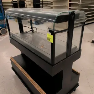 Hatco GRAL-48D portable hot food merchandiser. Features curved glass sneeze guard, overhead heating elements with lights, and a lower open storage und