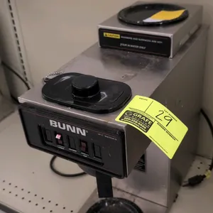 Bunn VP17-2 (SST) coffee maker. Features stainless steel construction, (1) lower warmer, (1) top warmer, and a plastic brew funnel. S/N: UP17049328. E