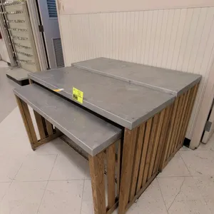 3-piece nesting display table set. Features wrapped metal tops and slatted wood bases. Dimensions range from 42" to 48"L.