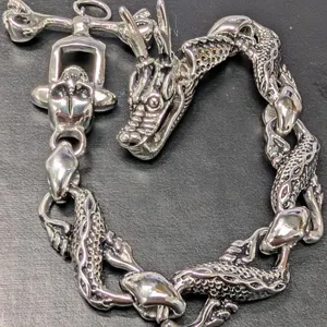 $150, stainless steel dragon bracelt 8", retail value $150