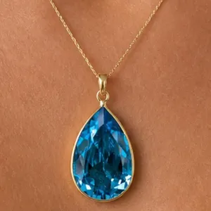 $500, 10k(1.05g),  blue topaz (4ct) pendant, retail value $500