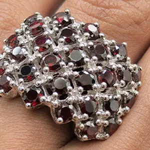 $700, silver(9g),  garnet (2.8ct) ring, retail value $700