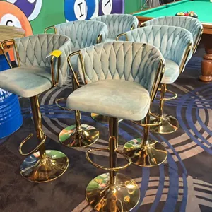 GROUP OF 6 TURQUOISE UPHOLSTERED BRASS BAR STOOLS