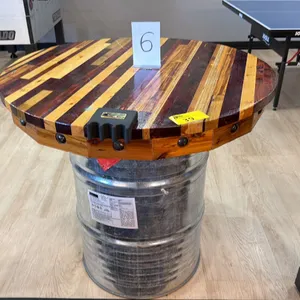 39" DIAMETER WOODEN TABLE TOP ON SILVER 50 GALLON BARREL DRUM - APPROX. 3FT HIGH