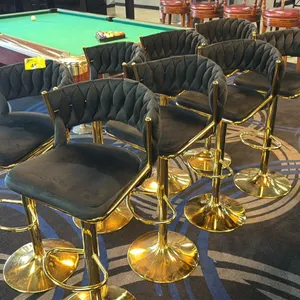 GROUP OF 8 BLACK UPHOLSTERED BRASS BAR STOOLS