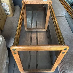 WOOD AND GOLD TONED TABLE FRAME AND GLASS TOP