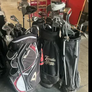 Golf Bags with Drivers and Assorted Clubs