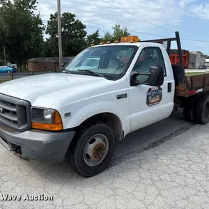 1999 Ford F350 dump flatbed pickup truck