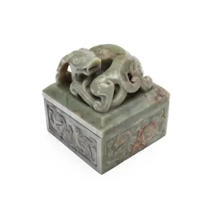 CHINESE CARVED JADE MOTHER-AND-CHILD SEAL SET