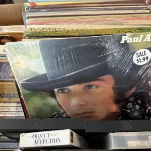 Record Albums, Cassette Tapes, and VHS Tapes
