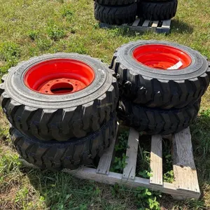 (4) New 10 - 16.5 Skidsteer Tires w/rims