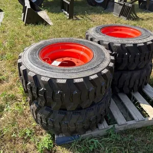 (4) New 12 - 16.5 Skidsteer Tires w/rims