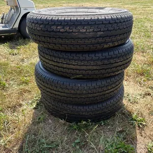 (4) New ST205/75 R15 Tires