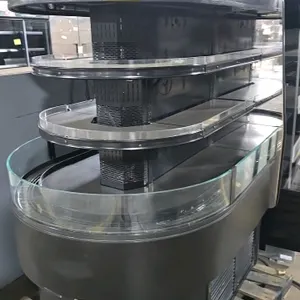 2016 Southern CaseArts MDI-03VN refrigerated wrap-around multideck display case. Features self-contained refrigeration, adjustable shelves, and glass 