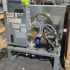 2011 Hussmann HICA0206SSKCB Hussmetic commercial indoor condensing unit. Features an air-cooled design with a single condenser fan, Hussmetic compress