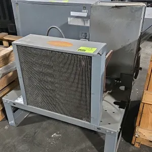 Hussmann HICA0115SSKAB commercial hermetic indoor condensing unit. Features an air-cooled design with a compressor, fan assembly, and integrated elect