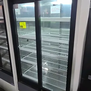 Panasonic MPR-514 vertical refrigerator. Features sliding glass doors, digital temperature display, adjustable wire shelves, and self-contained refrig