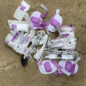 Ultra wheels roller blades/ice skates, adjustable from size 1-4, wheels are removable to switch to skates