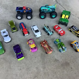 Toy cars, monster trucks, mostly Hot Wheels, JD Gator