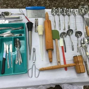 Kitchen utensils, rolling pin, spatula, grater, serving spoons, etc.