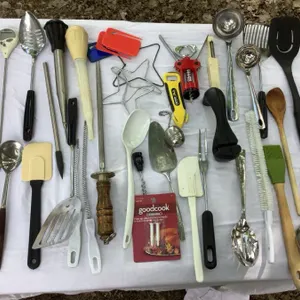 Kitchen utensils, serving spoons, knife sharpener, bottle openers, scissors, etc.