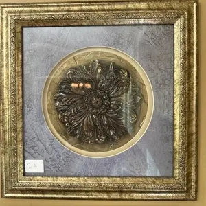 2- wall art features an ornate, floral-patterned