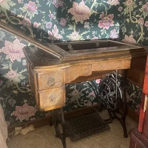Sewing machine table with old sewing machine.