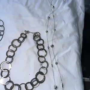 5 necklaces. Silver and black