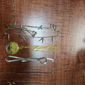 ASSORTED GOLD AND SILVER COLORED NECKLACES, AND CHAINS