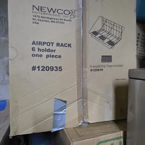 Newco 120935 6-holder wire airpot rack. Features a one-piece wire frame design. Includes six drip trays. Comes in original packaging.