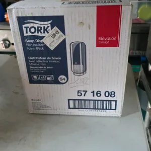 Tork 571608 Elevation Design foam soap dispenser. Features black plastic construction and touch-free operation with an Intuition sensor. Designed for 
