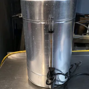 Regal Ware K7001 100-cup automatic percolator urn. Features aluminum construction, level indicator sight glass, plastic dispensing spigot, and side ca