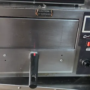 2019 Quik n' Crispy GF II commercial greaseless air fryer. Features a slide-out mesh cooking basket, digital touchscreen control panel, and USB port. 