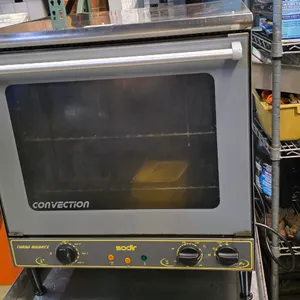 Equipex Sodir FC60G Turbo Quartz half-size electric countertop convection oven. Features top quartz heating elements, glass door, and manual dial cont