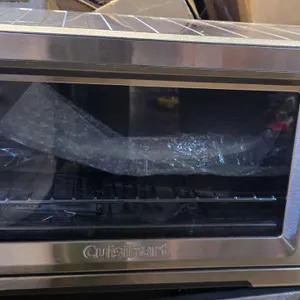 Cuisinart TOB-260N1 Chef's Convection Toaster Oven. Features stainless steel construction, digital display, control dial, and multiple cooking pre-set