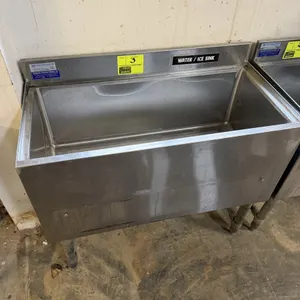 New England Air stainless steel undercounter insulated ice and water bar sink. Features a single insulated compartment, integrated backsplash, and a c