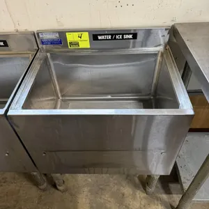 New England Air undercounter insulated ice and water bar sink. Features stainless steel construction, an insulated well, and a removable bottom drain 