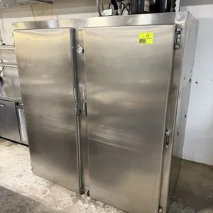 Two-door stainless steel dough retarder. Features stainless steel interior and exterior construction, top-mounted refrigeration system, and integrated