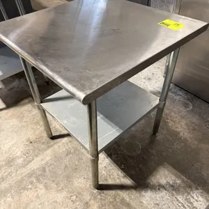 BlendPort stainless steel equipment stand. Features a stainless steel work surface, adjustable galvanized undershelf, and galvanized steel legs with a