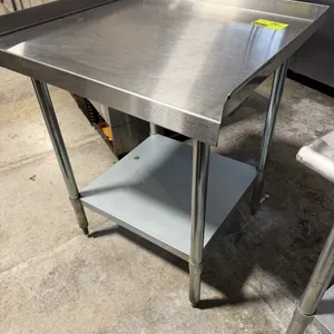 Stainless steel equipment stand. Features a stainless steel top with 3-sided upturned edges and an adjustable galvanized steel undershelf. Mounted on 