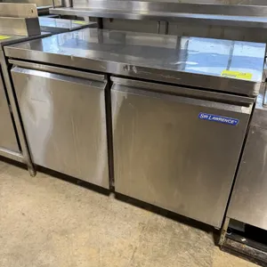 Sir Lawrence SLUF48 flat-top two-door undercounter refrigerator. Features stainless steel construction and interior wire shelving. S/N: 9125120083. El