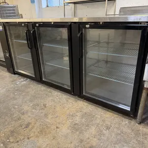 U-Star USBB-9028G three-door glass back bar cooler. Features black vinyl-clad steel exterior, stainless steel top, and double-pane glass doors. Interi
