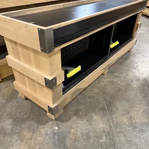 JSI Store Fixtures wooden end cap display fixture. Features a light wood frame with metal corner reinforcement brackets, a divided black interior comp