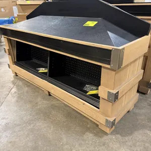 JSI Store Fixtures wooden produce and bakery display end cap. Features a sloped top with a black textured finish, crate-style wood detailing, metal co