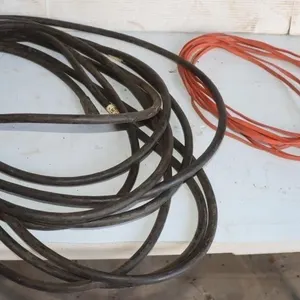 2 Extension Cords: 1) Black Heavy Duty, 1) 14 GA