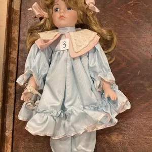 Porcelain doll. 16T