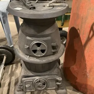 Old cast iron wood stove.  27T